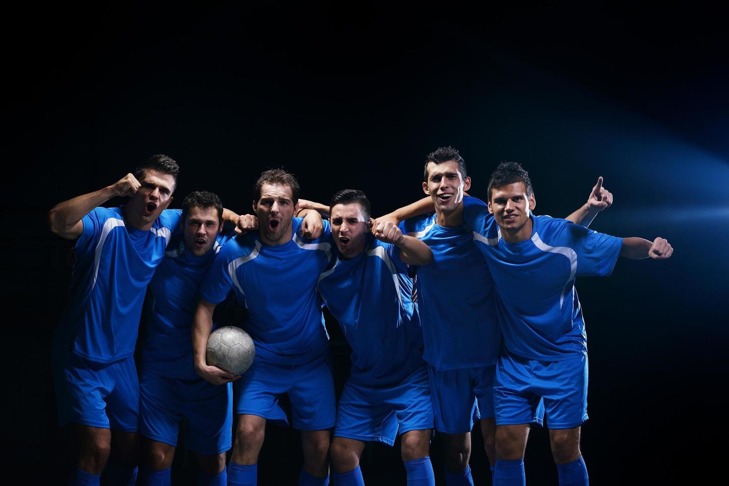 soccer players celebrating victory photo