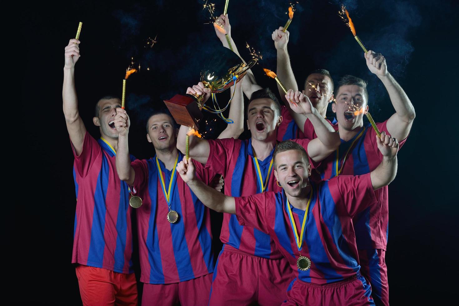 soccer players celebrating victory photo