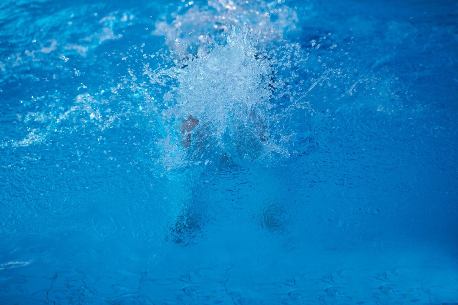 swimmer excercise on indoor swimming poo photo