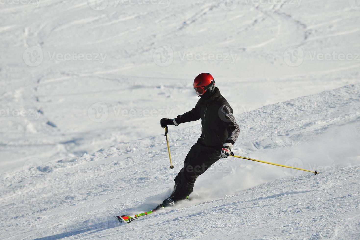 Skiers on mountain photo