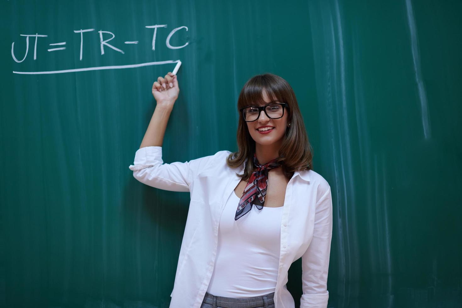 the professor explains the task on the board photo