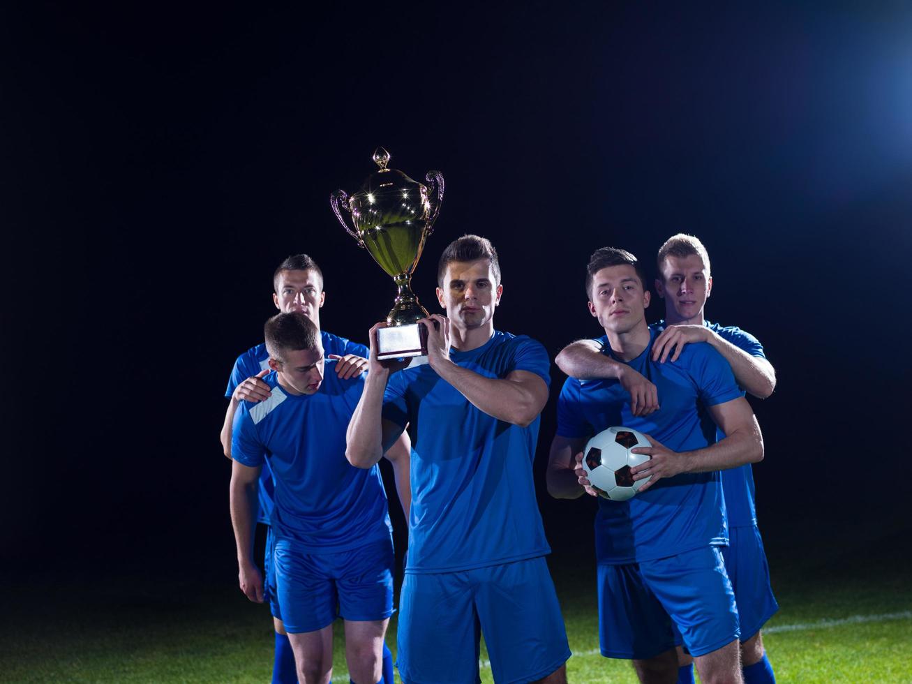 soccer players celebrating victory photo