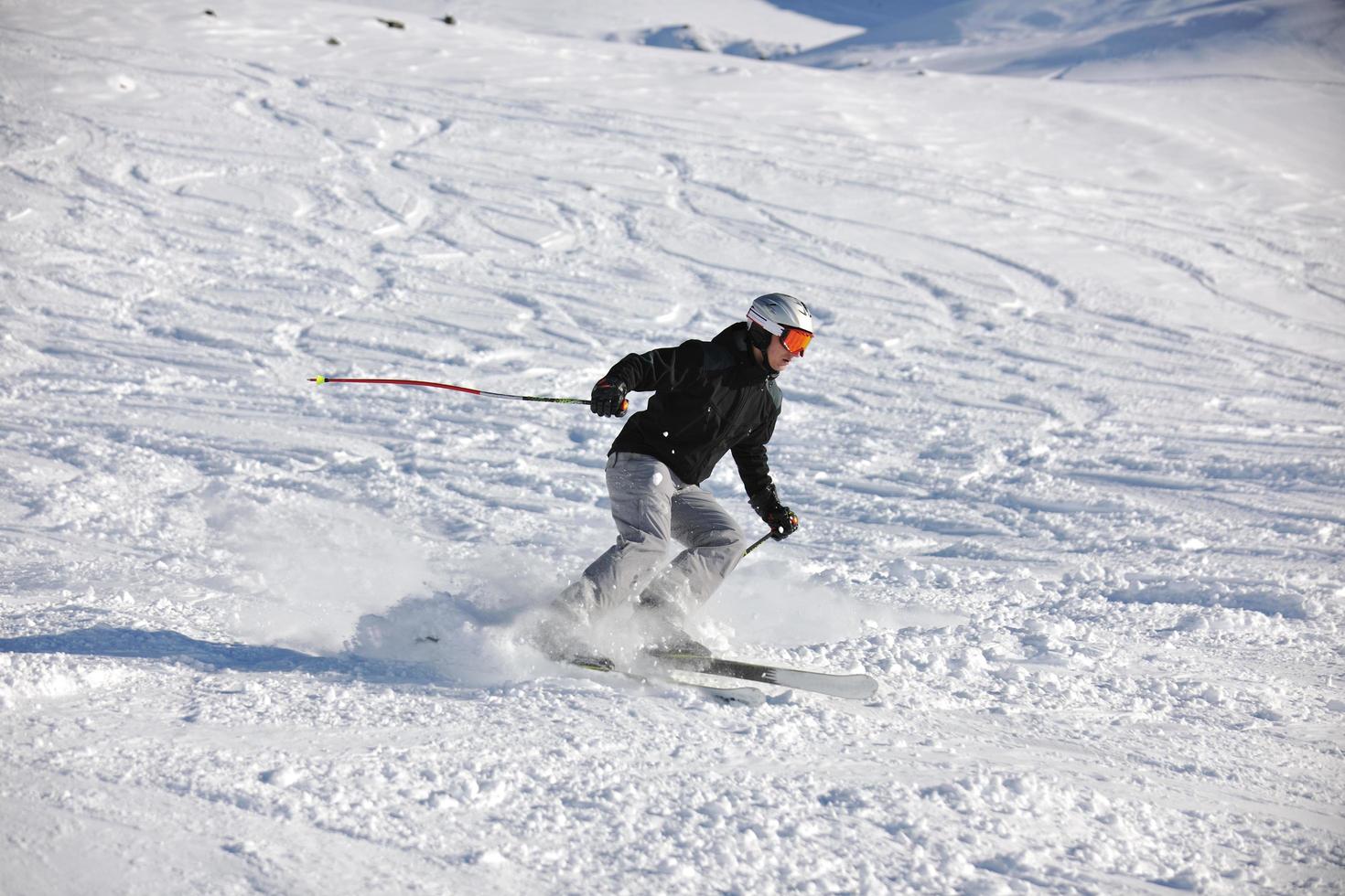 skiing on on now at winter season photo