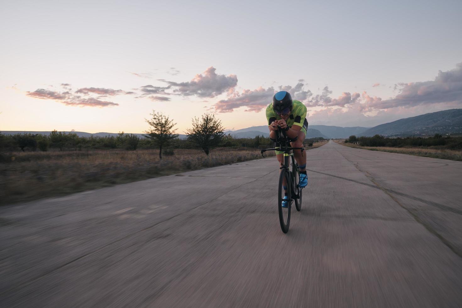 triathlon athlete riding a  bike photo