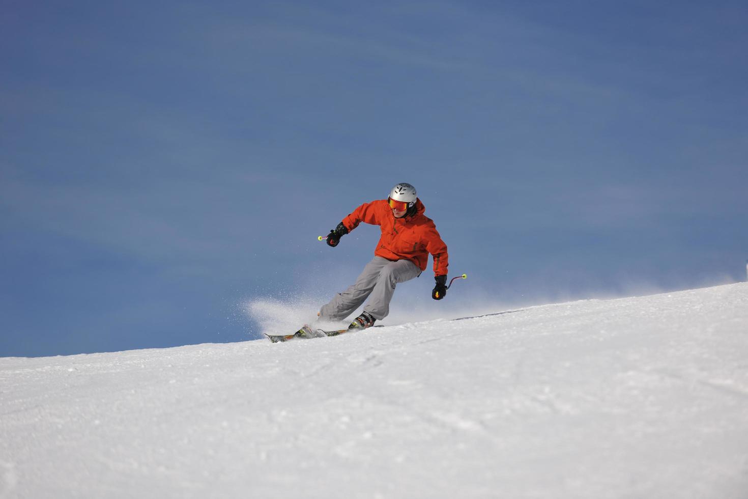 skiing on on now at winter season photo