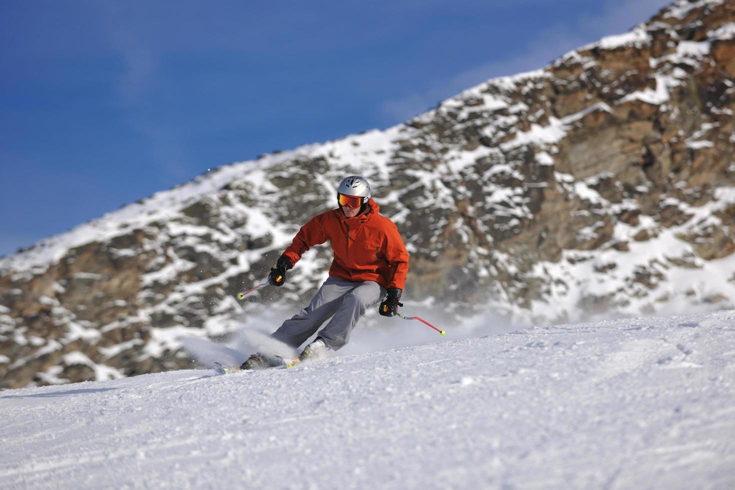 skiing on on now at winter season photo