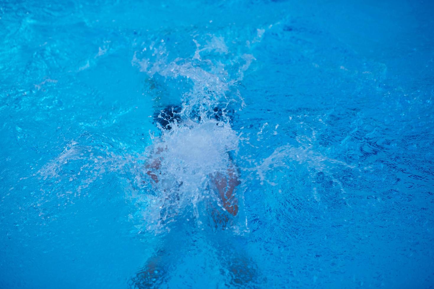 swimmer excercise on indoor swimming poo photo