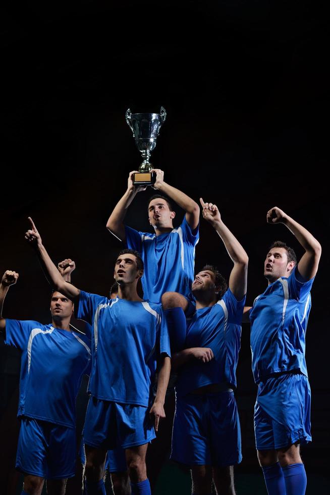 soccer players celebrating victory photo