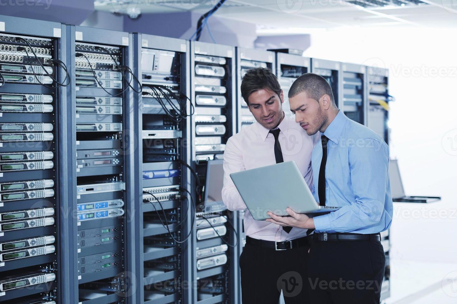 it enineers in network server room photo