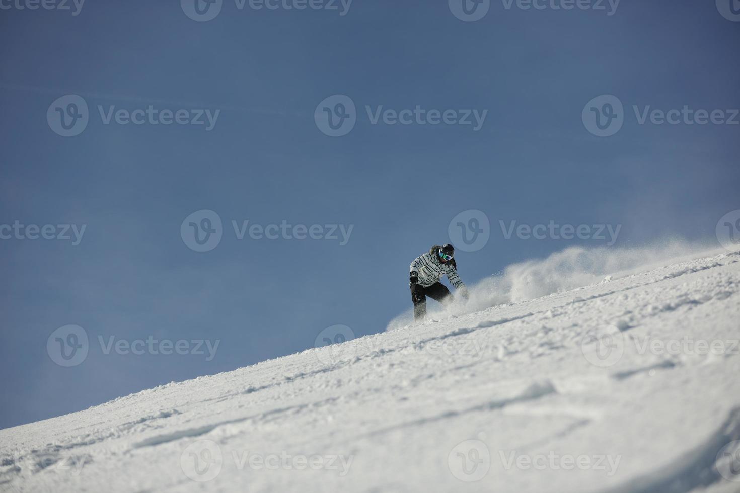 Skiers on mountain photo