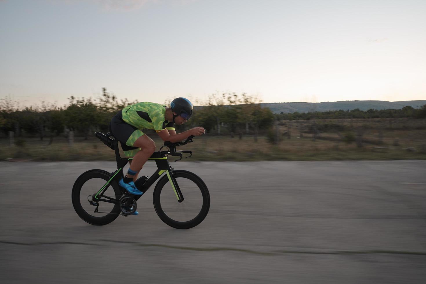 triathlon athlete riding a  bike photo