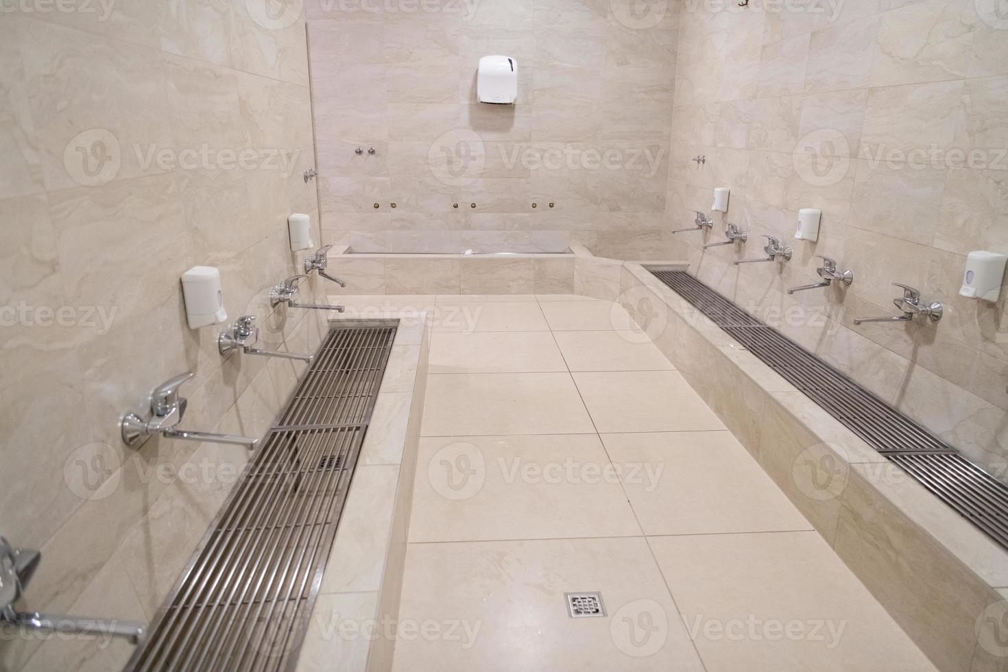 Muslim bath located in the premises of a mosque used for ablution before praying photo