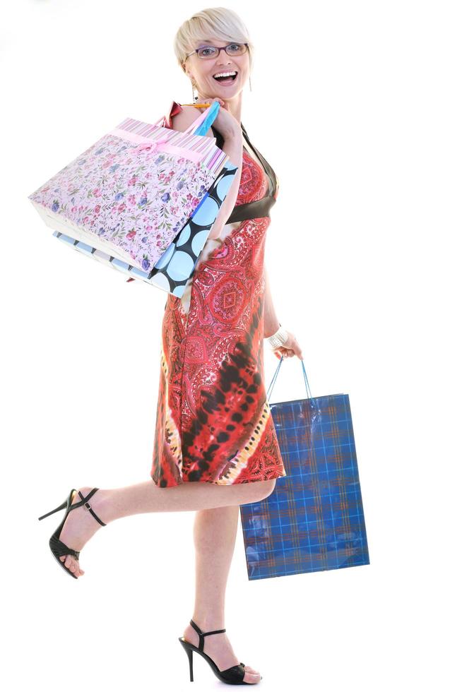 happy young adult women  shopping with colored bags photo