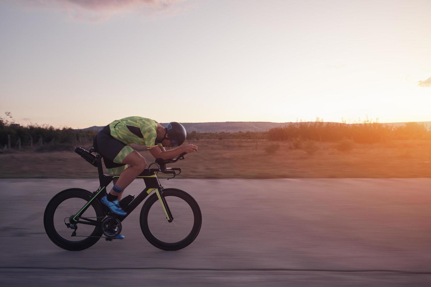 triathlon athlete riding a  bike photo
