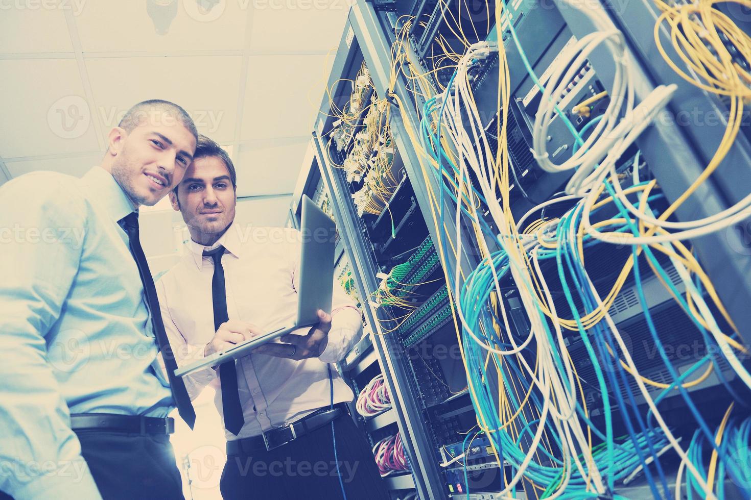 it enineers in network server room photo