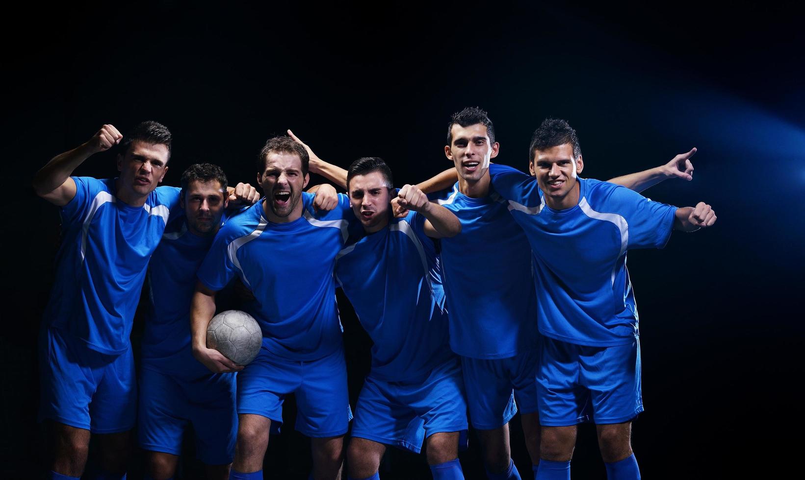 soccer players celebrating victory photo