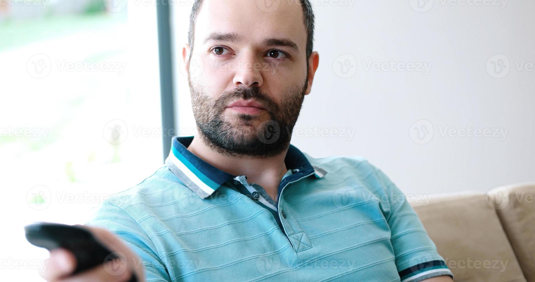 Happy Man Watching Television photo