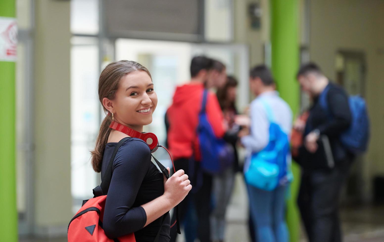 famel student with modern technology in school photo
