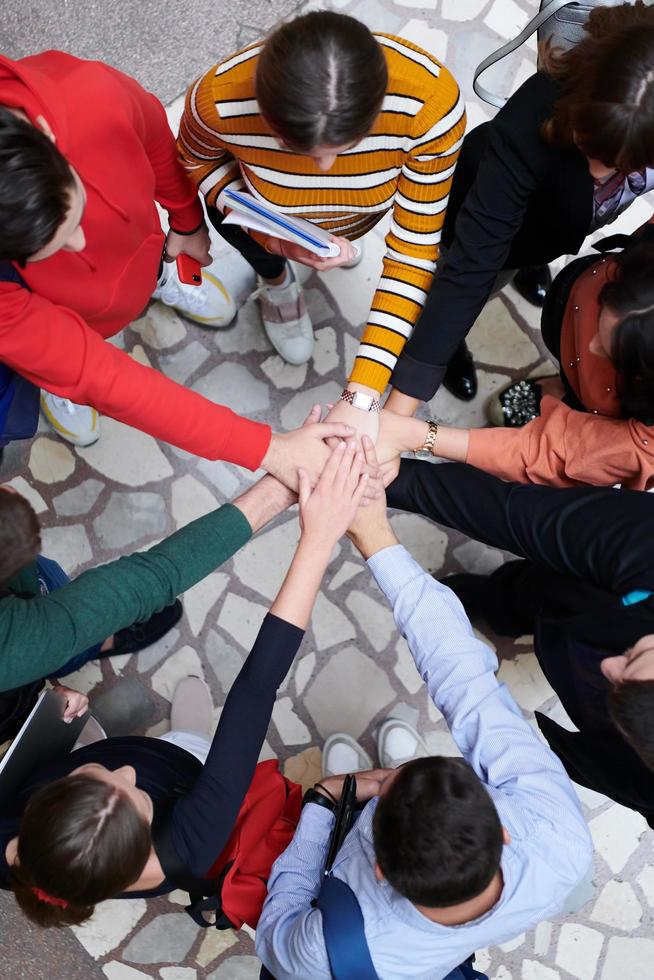 group of happy young people showing their unity. photo