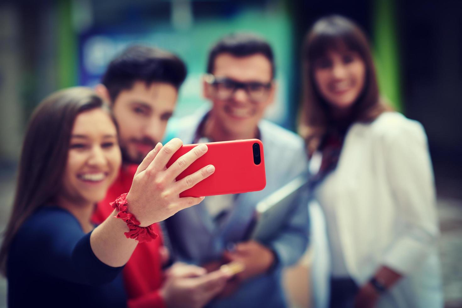 Group of multiethnic teenagers taking a selfie in school photo