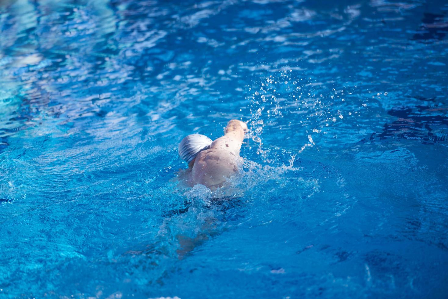 swimmer excercise on indoor swimming poo photo