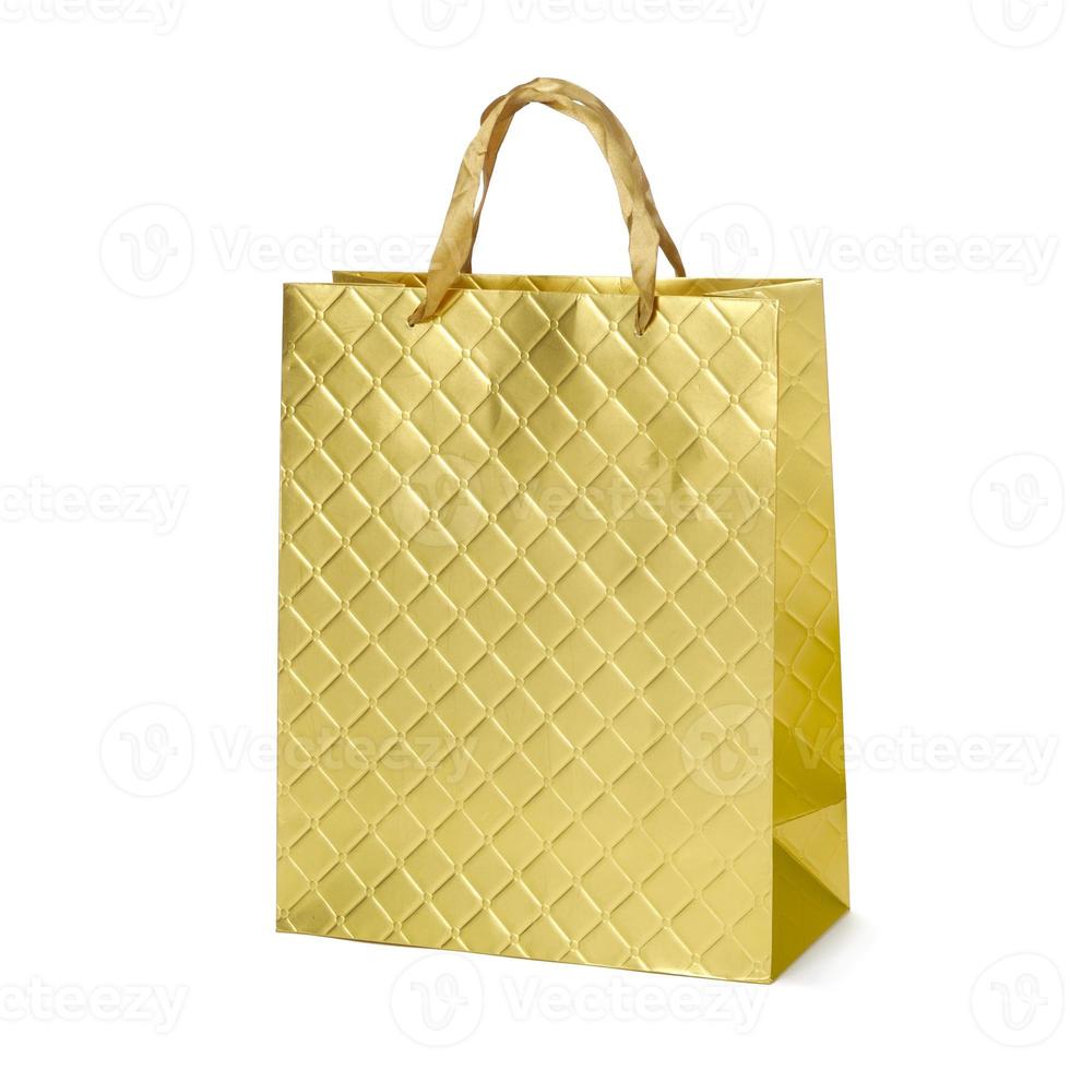 Golden paper shopping bags isolated on white background, Woman love online shopping Concept photo