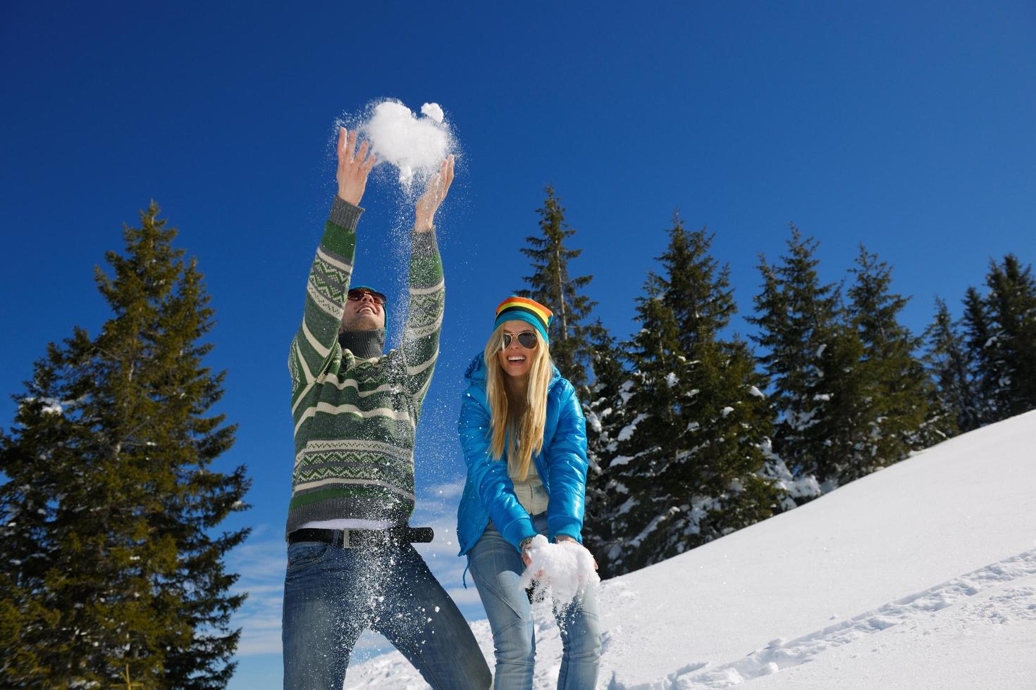 young couple on winter vacation photo