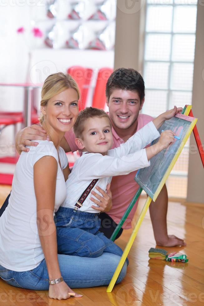 family drawing on school board at home photo