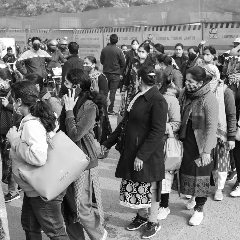 Delhi, India December 25 2021 - Delhi Contractual Guest Teachers with posters, flags and graffitis protesting against Delhi AAP Government for making policy, Delhi Teacher protesting Black and White photo