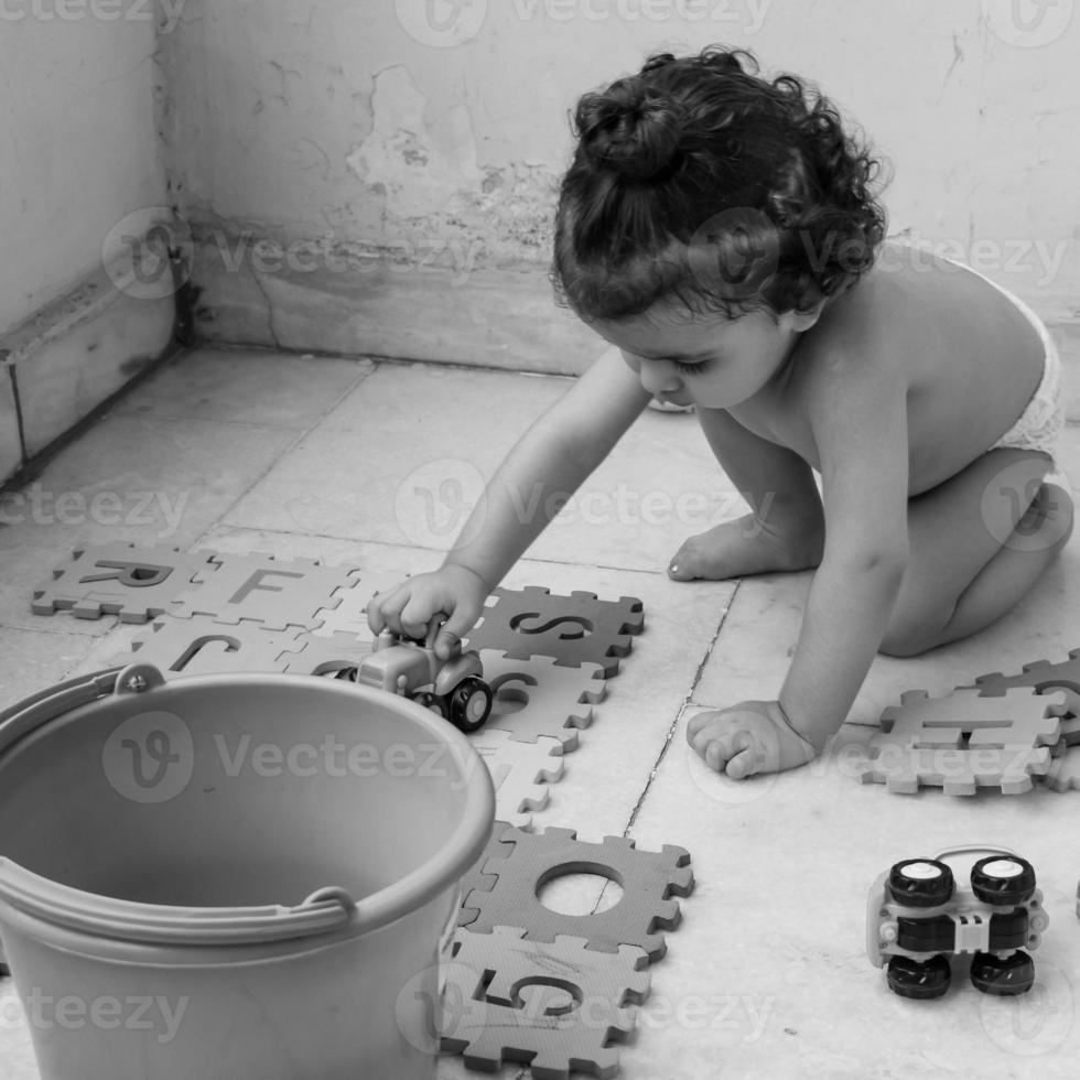 Cute little boy Shivaay sapra at home balcony during summer time, Sweet little boy photoshoot during day light, Little boy enjoying at home during photo shoot - Black and White