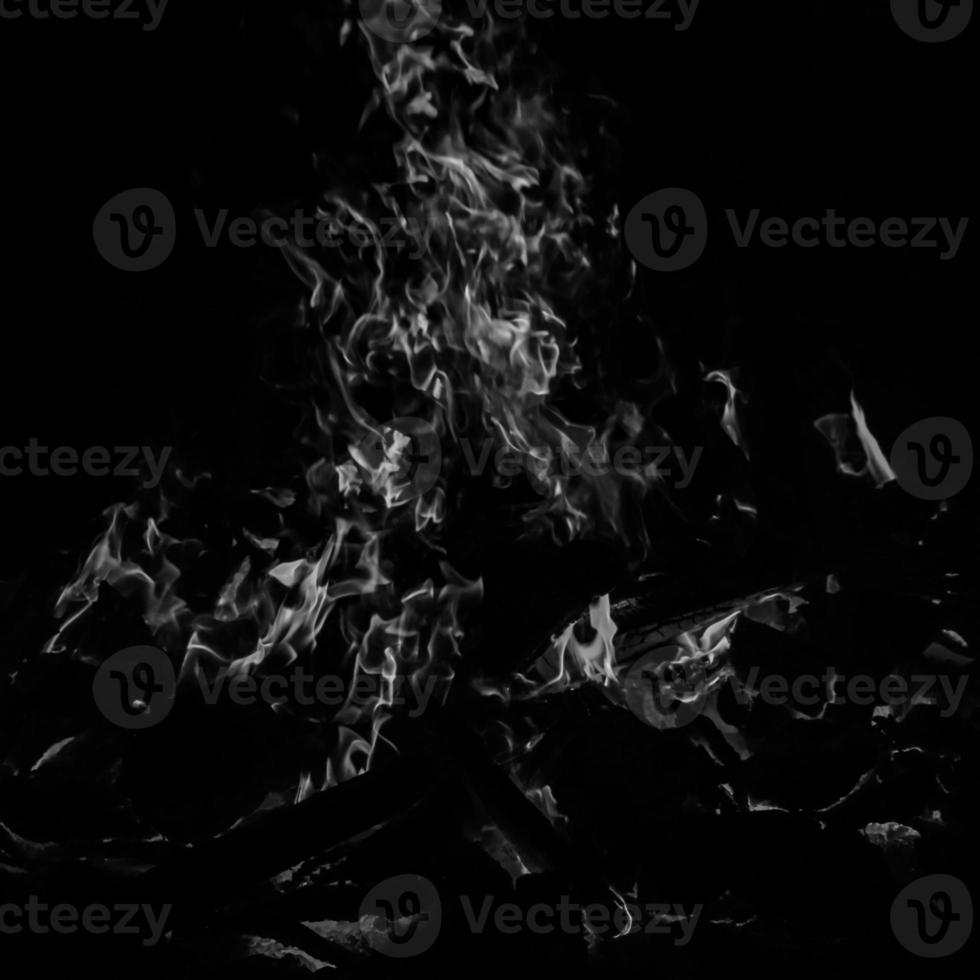 Fire flames on black background, Blaze fire flame texture background, Beautifully, the fire is burning, Fire flames with wood and cow dung bonfire Black and White photo