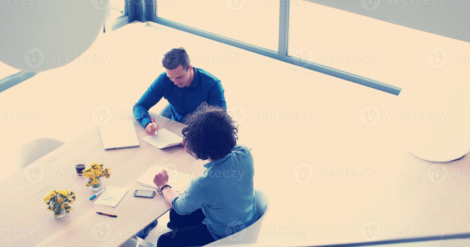 Startup Business Team At A Meeting at modern office building photo