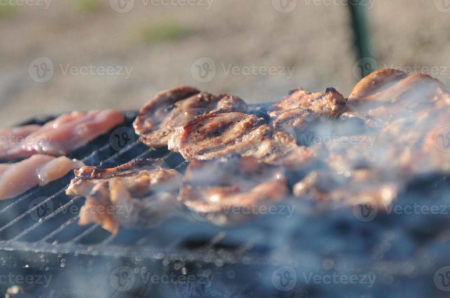 Meat on a grill photo