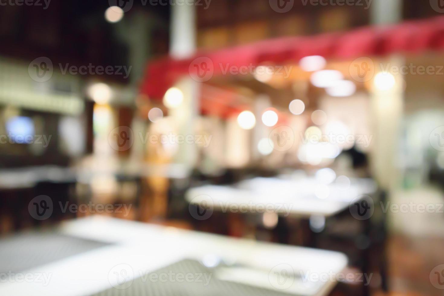 Restaurant cafe or coffee shop interior with people abstract defocused blur background photo