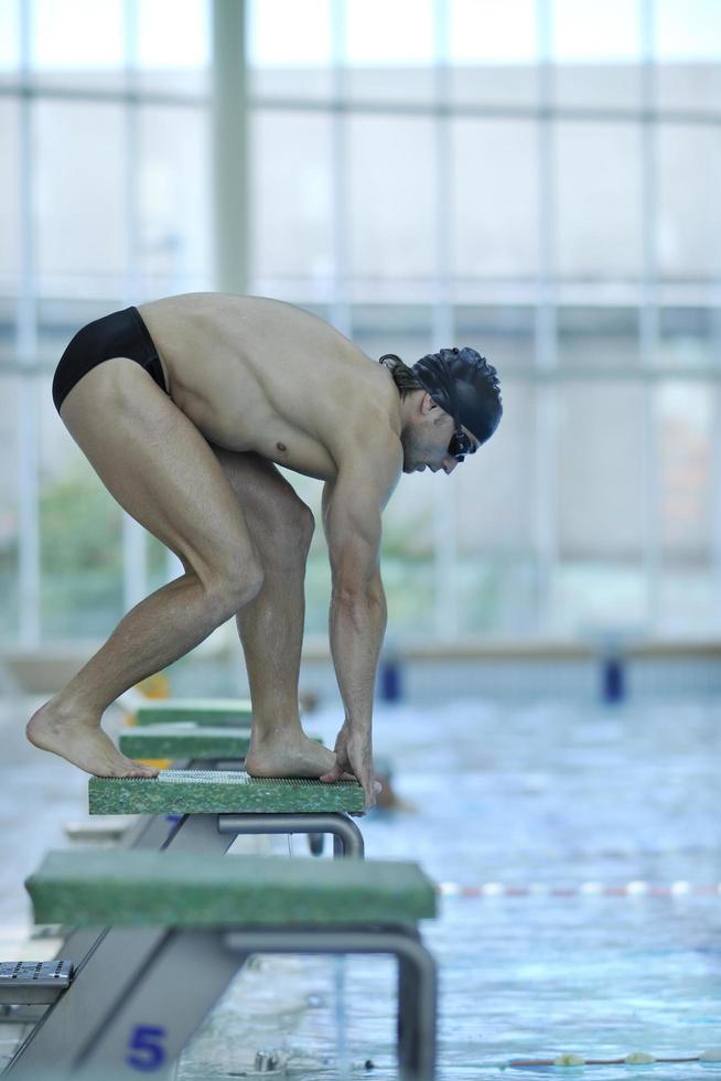 young swimmer ready for start photo