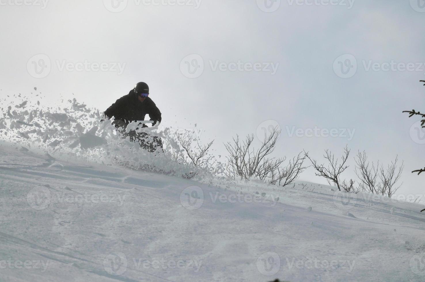 Skiers on mountain photo