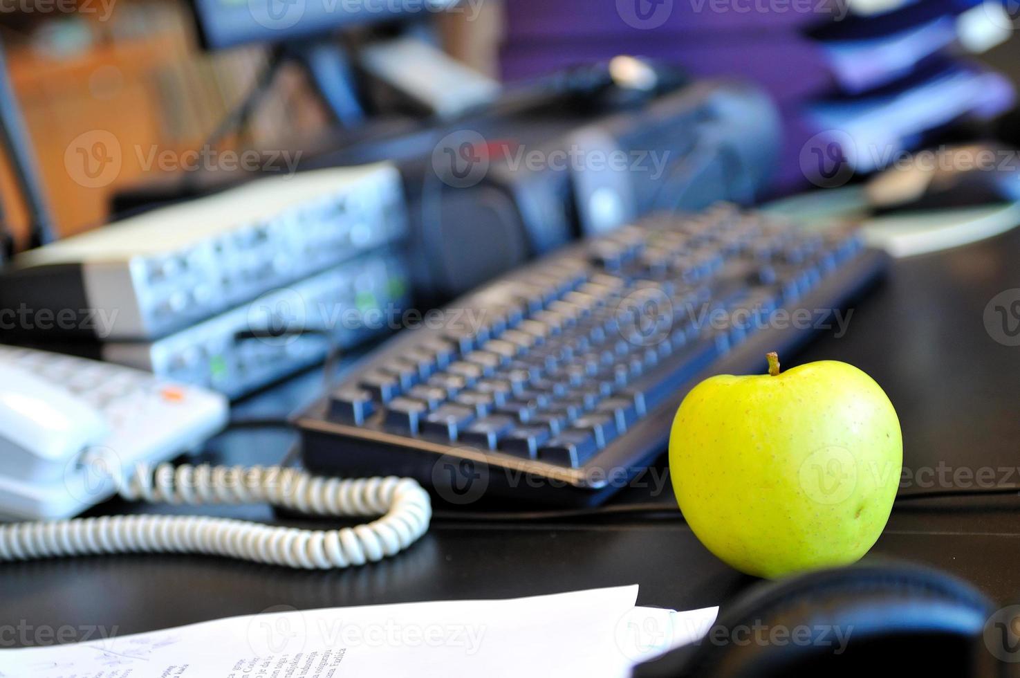 Apple on desk photo