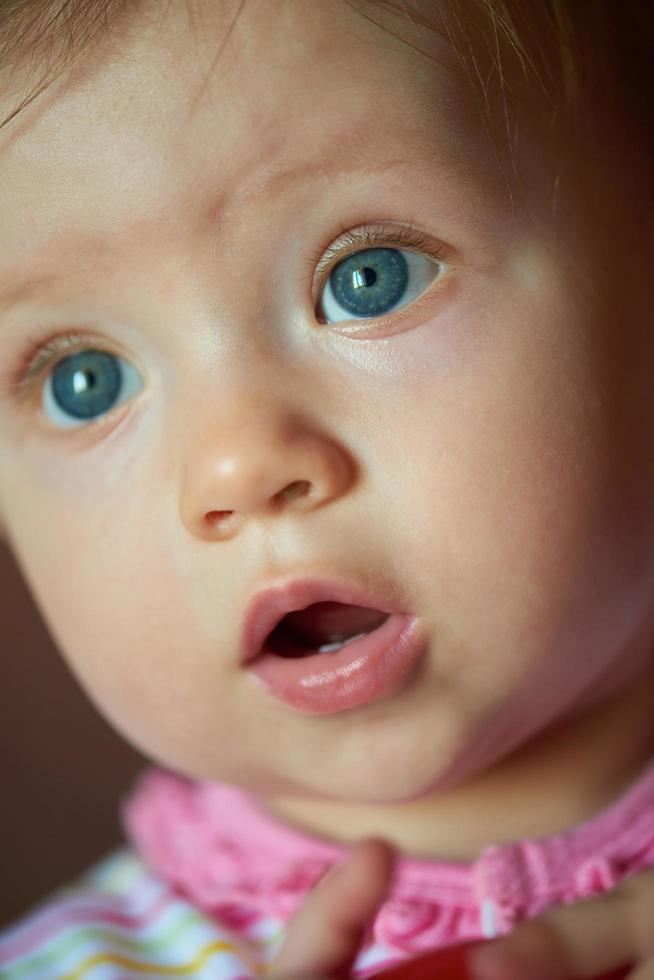 baby playing with toys at home photo