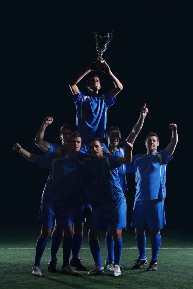soccer players celebrating victory photo