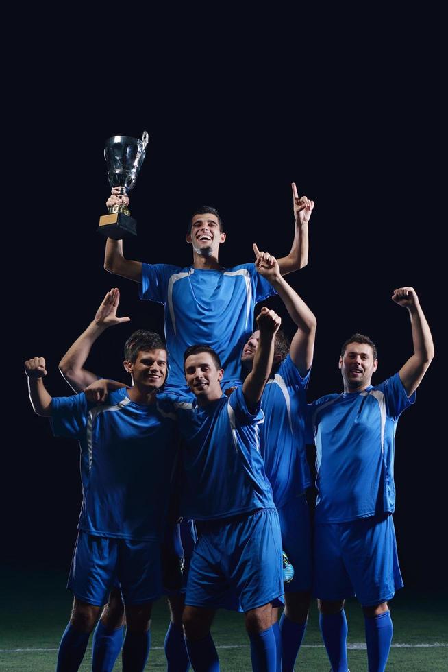 jugadores de fútbol celebrando la victoria foto