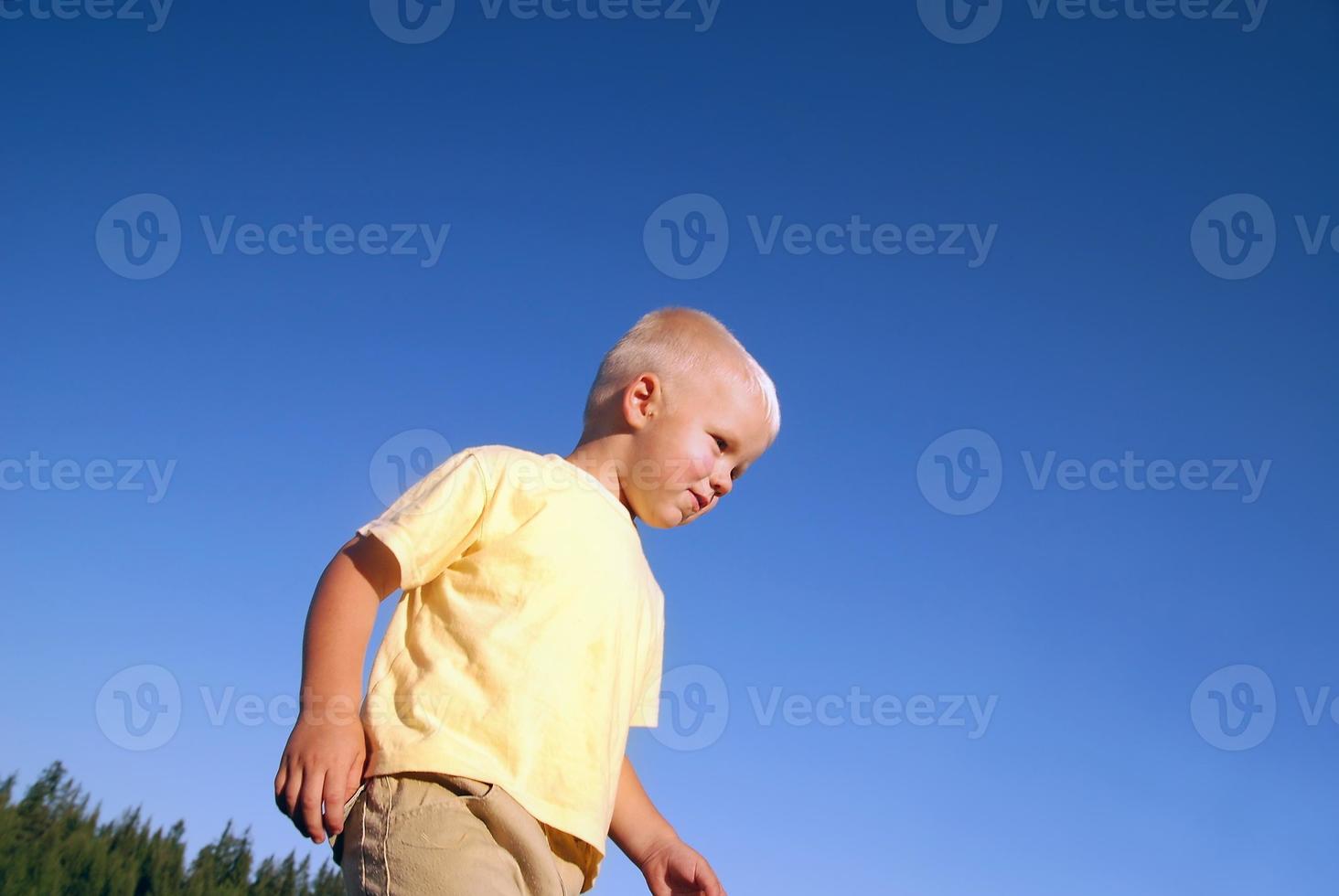 Child playing outside photo
