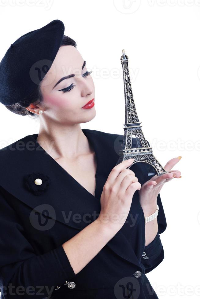 beautiful young woman with paris symbol eiffel tower photo