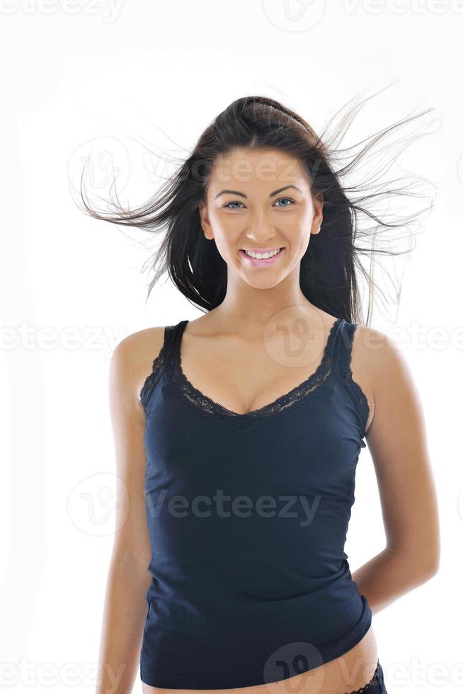 happy young girl isolated on white in studio photo