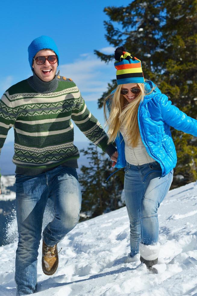 young couple on winter vacation photo