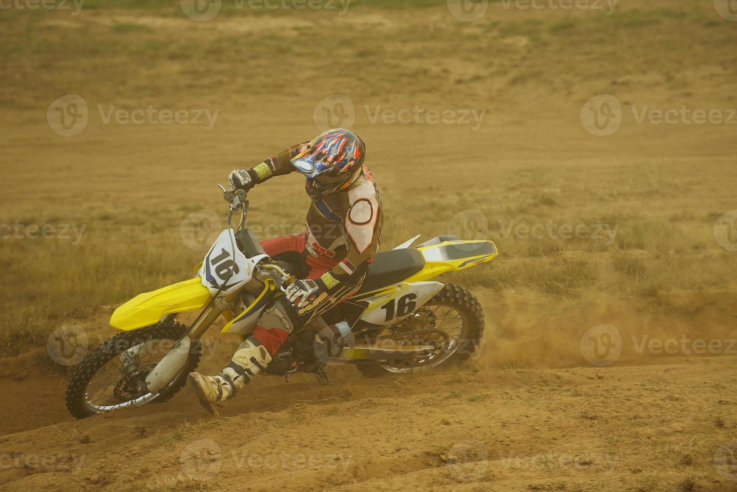 Riding a motocross bike photo