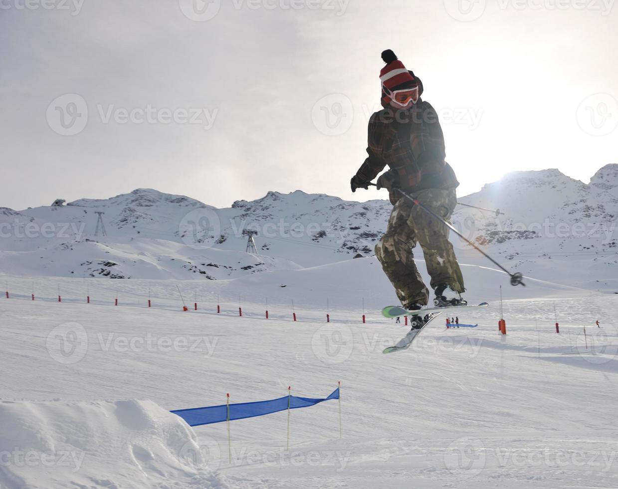 Skier on mountain photo