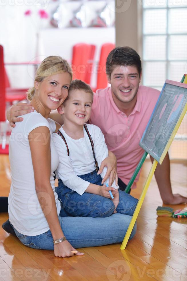 family drawing on school board at home photo