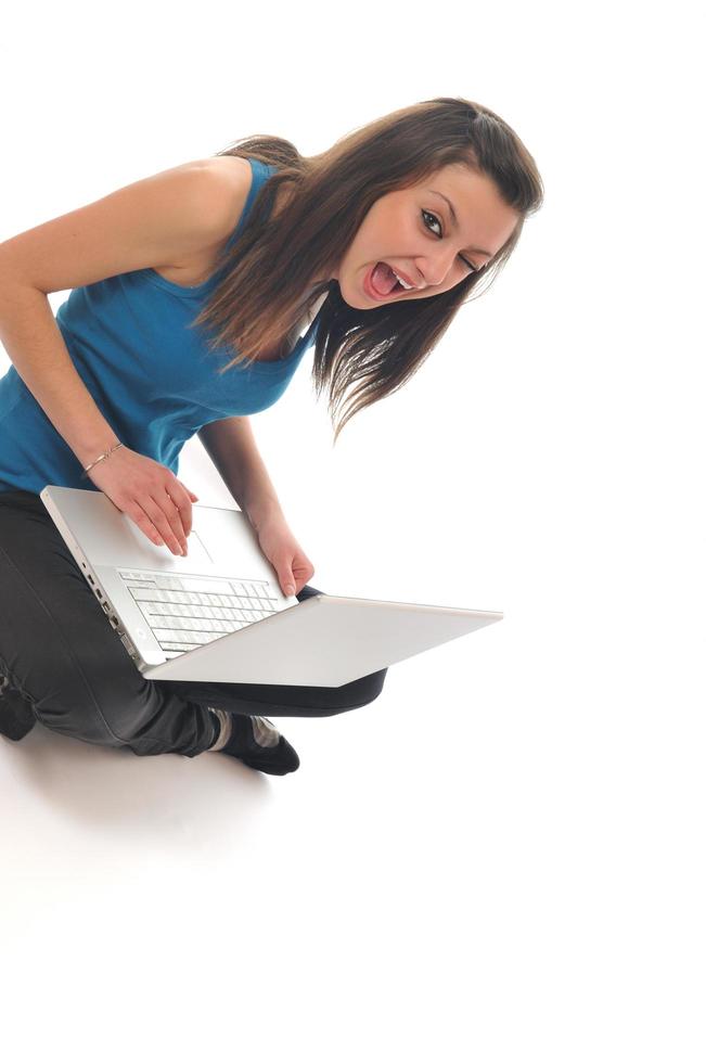 young girl work on laptop photo