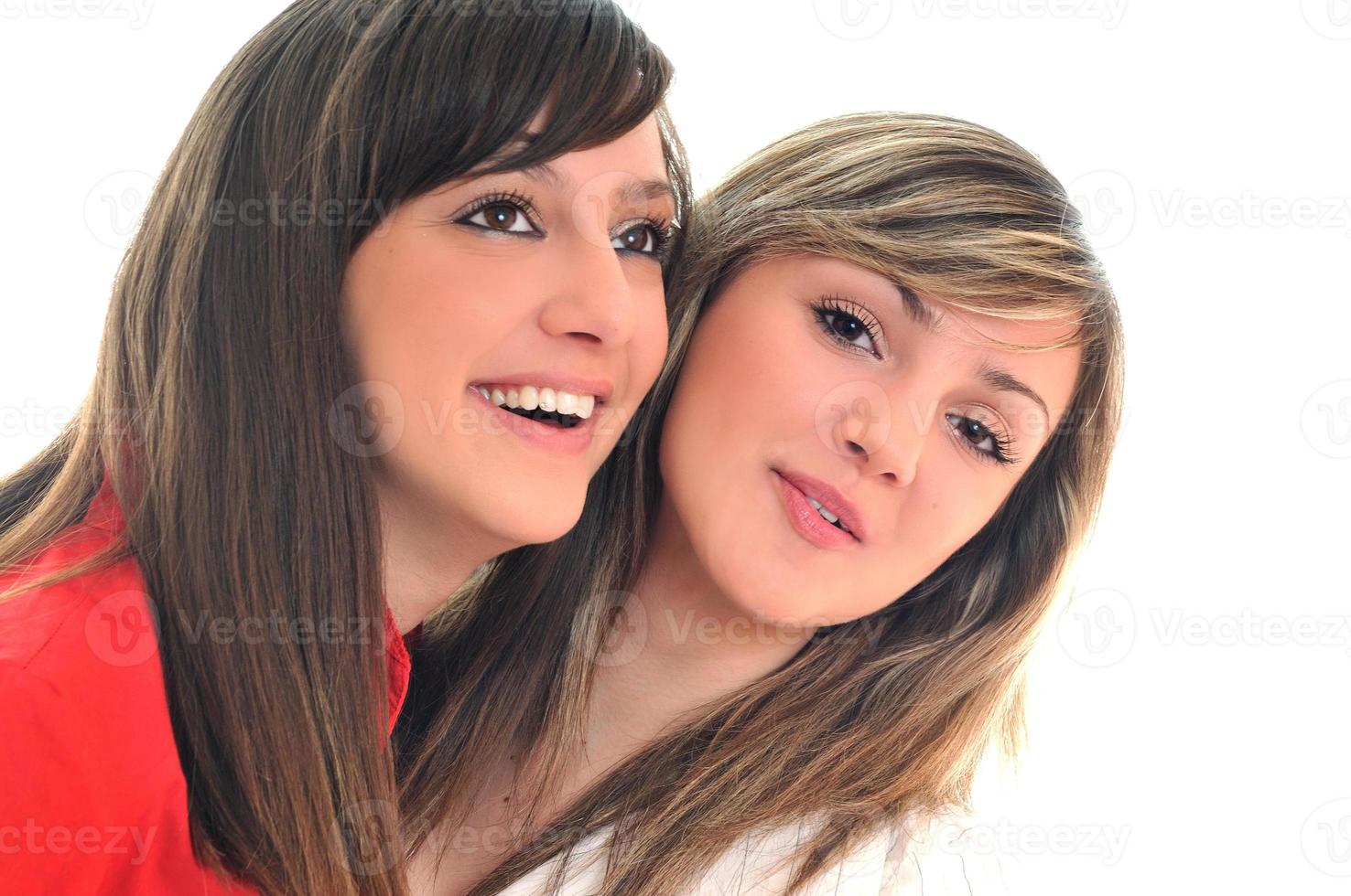 two young girls isolated on white photo