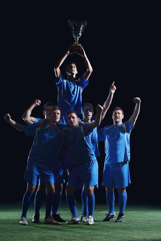 jugadores de fútbol celebrando la victoria foto